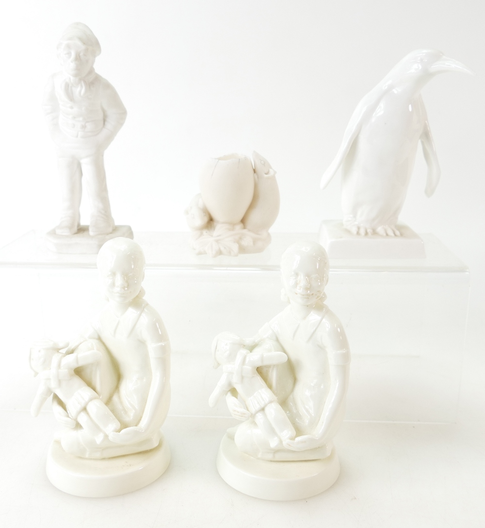 Three rare Royal Worcester white figures of a Penguin by Doris Lindner,