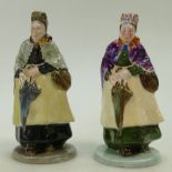 Two Crown Staffordshire figurines of an Old Lady with an umbrella in two different colourways (2)
