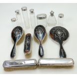 Four piece Silver and tortoise shell mirror and brush set,