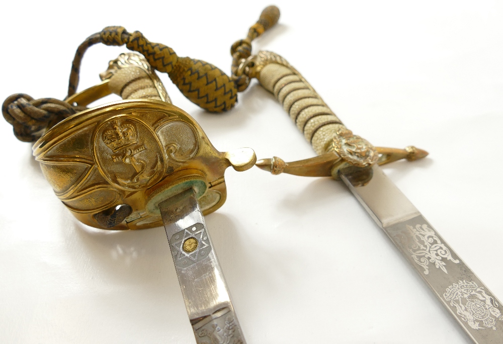 A group of interesting medals, swords and other items relating to Commander Herbert. - Image 3 of 9