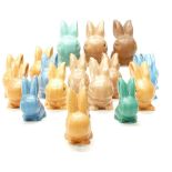 A good collection of Wadeheath models of seated rabbits in various sizes and colours including blue,