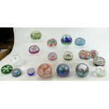 A collection of glass paperweights to include Millefiori multi cane items and limited edition