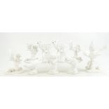 Six white glazed Crown Staffordshire birds by J T Jones and three white animal studies (9)