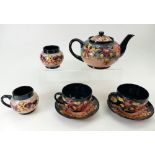 Moorcroft Teaset decorated in the Oberon design dated 1993, comprising teapot, sugar,