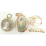 Four gold coloured metal items, two Pendants and two Brooches,