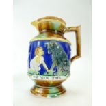 19th century English majolica jug decorated on both sides with a toddler and dog entitled "Cant you
