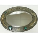 Arts and Crafts embossed Pewter framed oval mirror with Ruskin style high fired ceramic medallions,