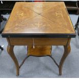 Victorian Burr Walnut Inlaid Fold Over Games table on carved walnut base,