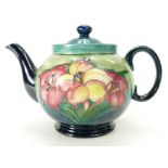 Moorcroft Teapot decorated in the Freesia design, height 15.