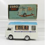 Corgi 413 White Mobile Butchers Shop in near mint condition and in original box in good condition.