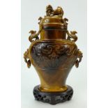 Tigers Eye carved Chinese vase & lid, with minor chips & damages to dog on lid.