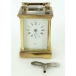 19th century brass Carriage clock, the dial marked Worcester Made in England, with key,