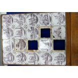 18th century Dutch Delft tile panel mounted in later oak frame,