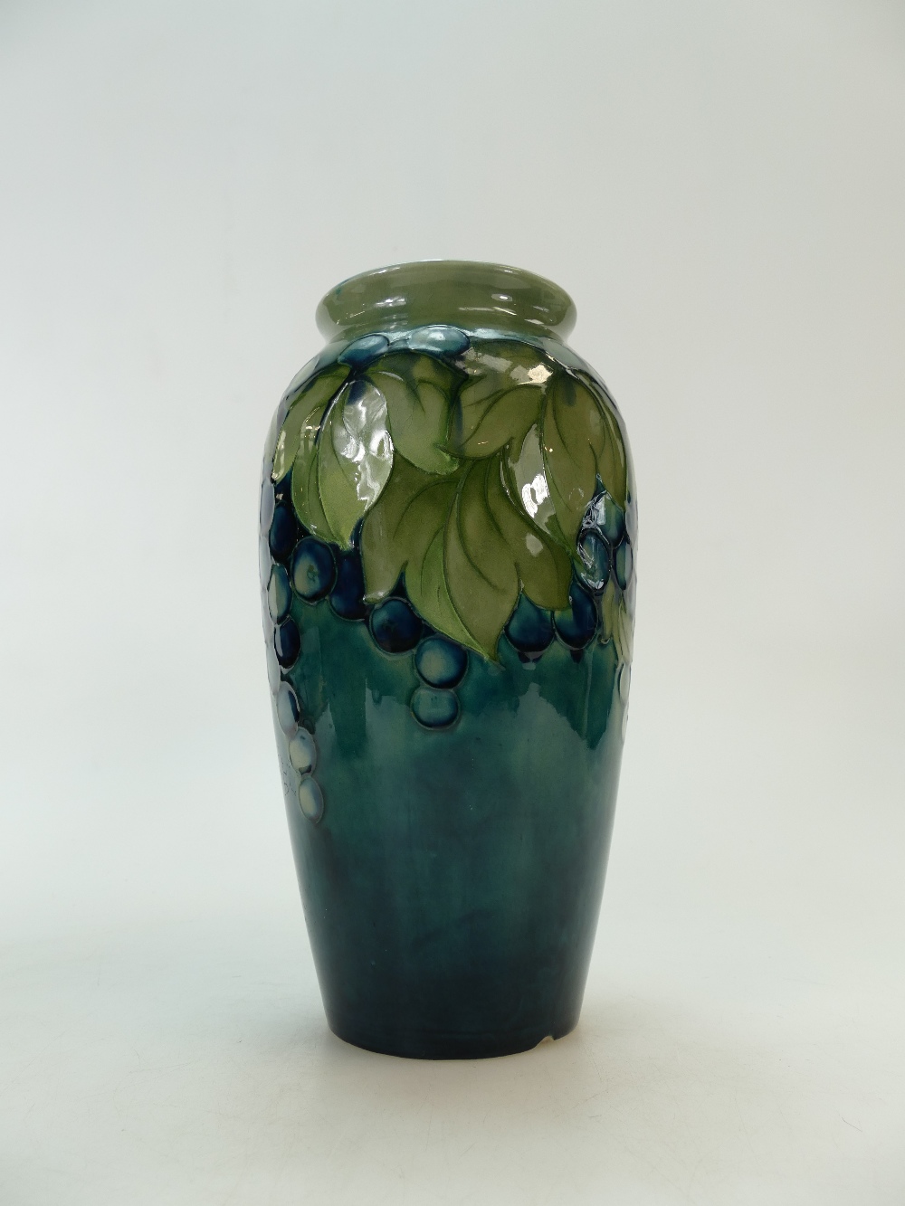 William Moorcroft 1920s vase decorated with the unusual two tone blue & green leaf and berries - Image 2 of 4