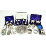 Group of Silver hallmarked items, including cased spoons (tongs not silver, nor included in weight),