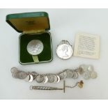 A collection of pre 47 silver threepence coins made into a bracelet,