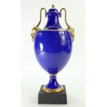 A prestige Wedgwood & Bentley twin handled Satyr Mask vase & cover decorated in powder blue with