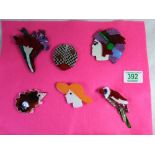 Six modern brooches with themes of Hedgehogs , ladies, parrots and lady birds etc