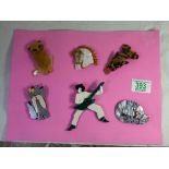 Six modern brooches with themes of cats, horses, dogs, guitarists etc