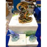 Large 'The Tudor Mint' branded Land of Dragons resin figure group together with two similar boxed