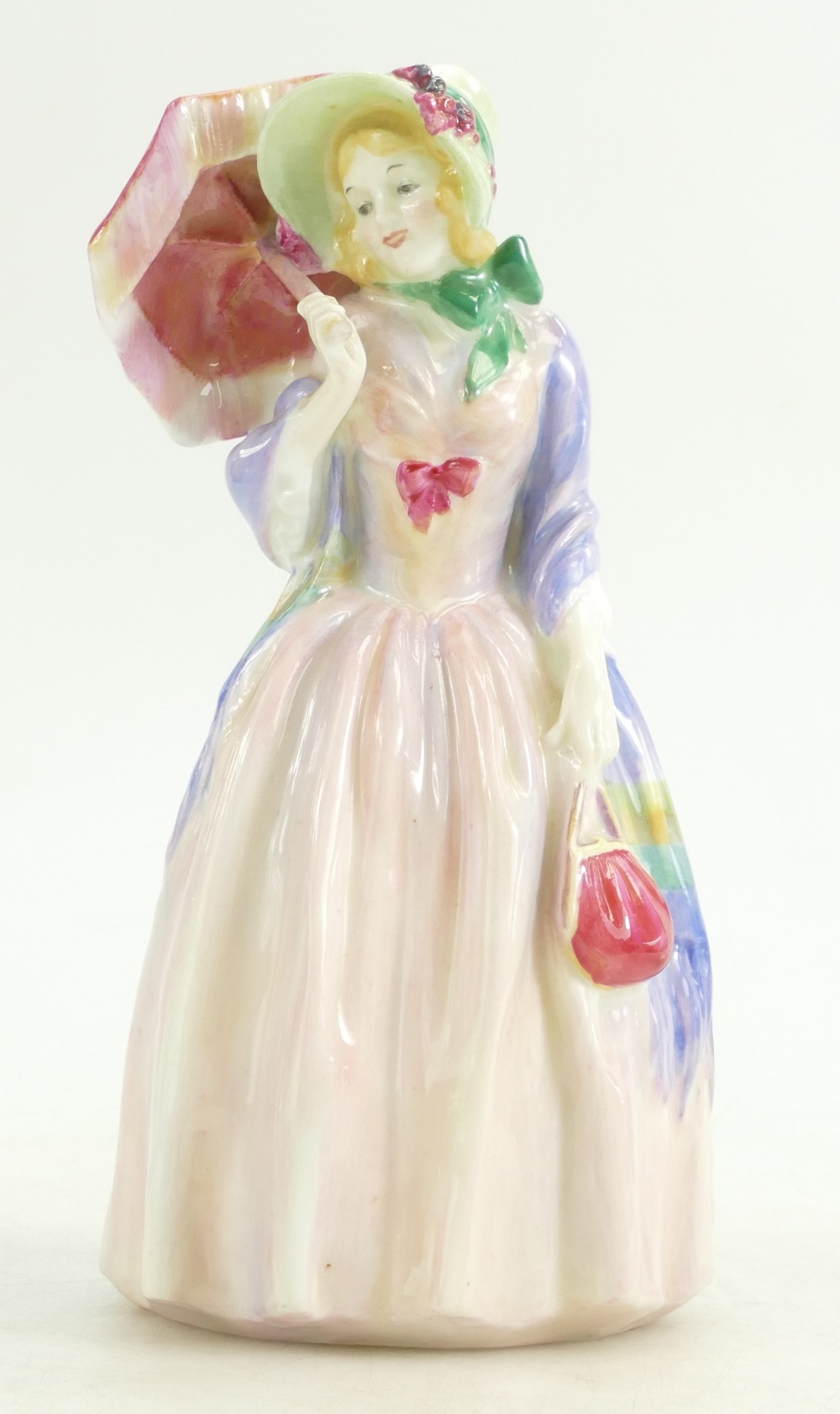 A Royal Doulton figurine of Miss Demure