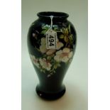 Moorcroft vase decorated in the Oriental Blossom design, height 26cm,