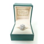 Ladies 9ct yellow gold diamond cluster ring - the large central diamond measuring approx. 0.