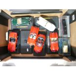 A collection of Burago model cars together with other similar items.