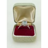 18ct white gold aquamarine & 12 diamond dress ring. Aqua 8.5mm x 7mm appx. 4.8g. Size O.