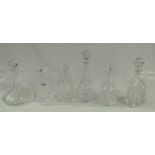 Six glass decanters with stoppers (6)