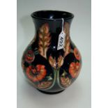 Moorcroft vase decorated in the Fantazie design, height 24cm,