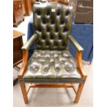 Reproduction antique style leather armchair