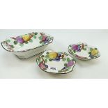 Charlotte Rhead Burleighware footed bowl and pair dishes decorated in the fruit design,