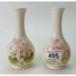 A pair of Moorcroft vases in the pink geranium design.