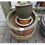 Small selection of stone and terracotta garden planters (9)