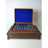 A boxed silver plated cutlery set together with another wooden cutlery display box (2)