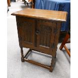 Oak linen fold small two door cabinet