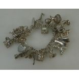 Silver bracelet with 20 silver charms,