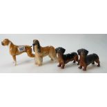 A small collection of Beswick figures of a Boxer dog 1202 (Brindle), Afghan Hound 2285,