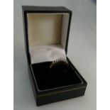 18ct Gold Ladies ring set 9 marquise cut diamonds, approx diamond weight .25ct.