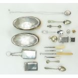 A collection of antique silver items including cutlery, vesta case, brushes,