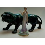 A large speckled green glazed model of a lion and a Peggy Davies model of a lady with headdress (2)