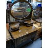 20th Oak dressing table on barley twist supports and oval mirror