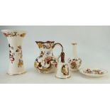 A collection of Masons Brown Velvet items including vases, bell,