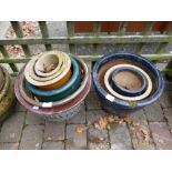 Mixed collection of stone and terracotta garden planters,