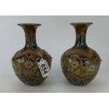 A Pair of Doulton Lambeth vases decorated with scrolling foliage and flower heads by Edith Lupton