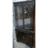 20th Century dark oak 4 door leaded glazed corner cupboard