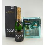 A Moet & Chandon 2006 Grand Vintage Champagne in box and Babycham sparkling perry bottle and glass