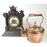 American mantle clock with oak surround and a brass and copper decorative tea pot. (2).