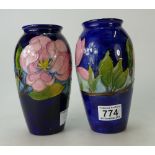 Moorcroft pair of vases, pink magnolia on blue ground height 18.